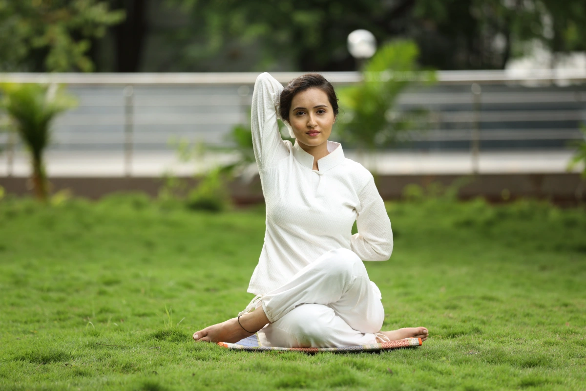 Guided yoga in the ashram garden